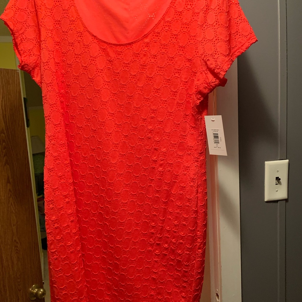 Size 2 extra large coral dress. Lace over lay.